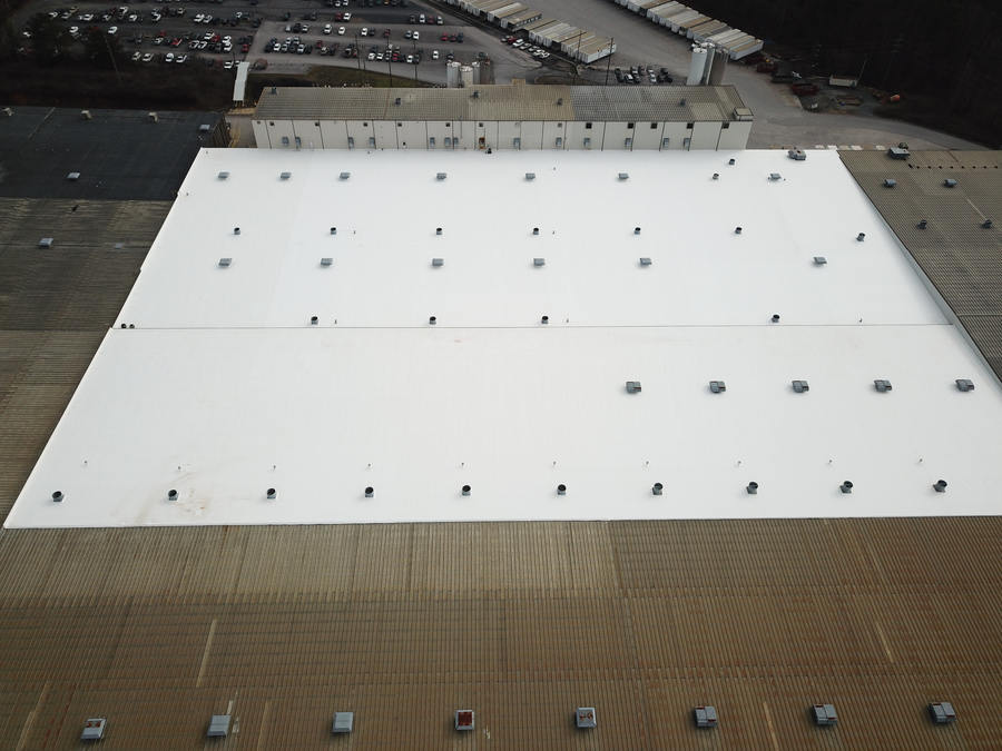 white commercial roof, aerial view, outdoors