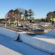 Many Workers Doing Maintenance On Roof